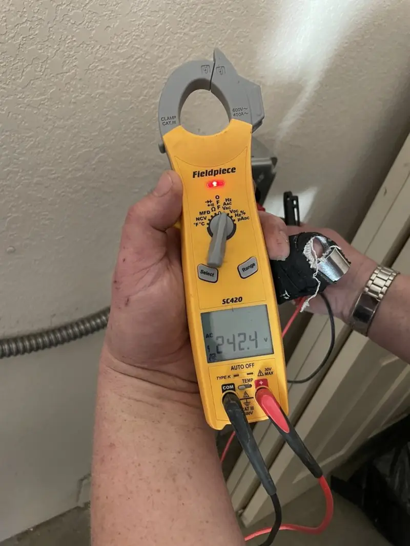 Voltage testing with clamp meter during Hot Tub / Pool Electrical Wiring in Winslow